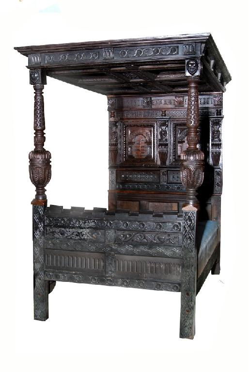 An Old English oak full tester bedstead constructed from 17th