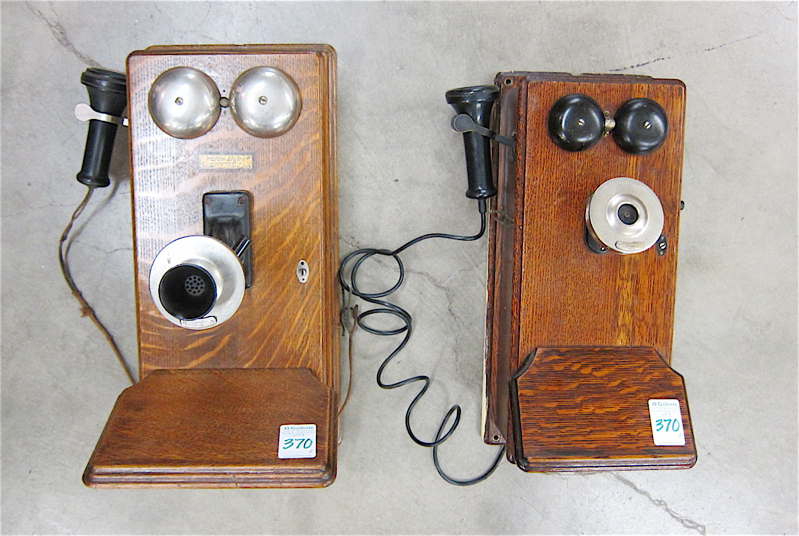 TWO ANTIQUE OAK CASED WALL TELEPHONES both by Western Electric