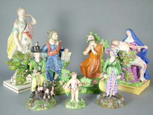 Seven 19th century Staffordshire pearlware figures to include St Peter