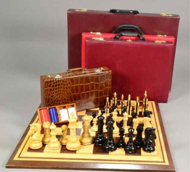 3 CHESS SETS 1 POKER CHIP CONTAINERIncluding a traditional style