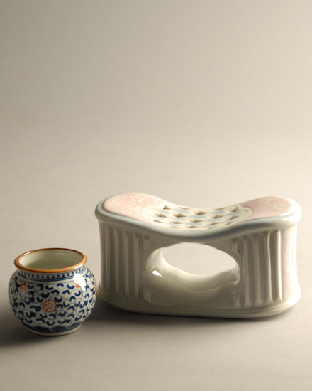 Two Pieces of Chinese Porcelain a head rest with pink