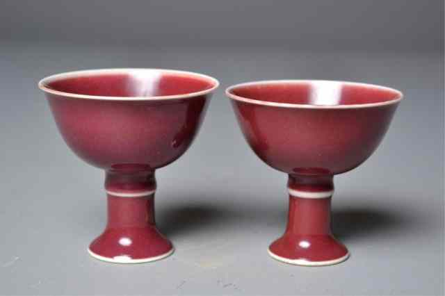 Pair of Chinese Red Glazed Footed Wine CupsMatching pair of