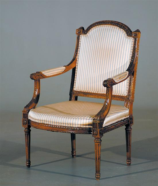 Louis XVI style fruitwood fauteuil early 20th century carved and