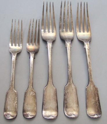 Three Victorian silver fiddle pattern table forks London 1864 and