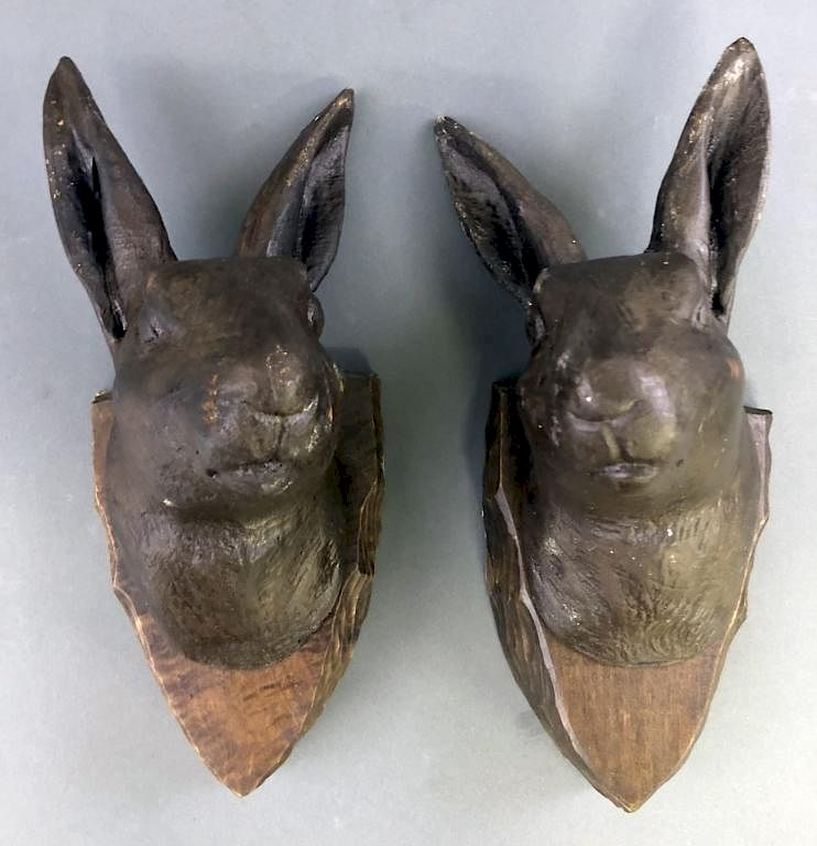 Two Wood Carved Rabbit Heads Two similar wood carved rabbit