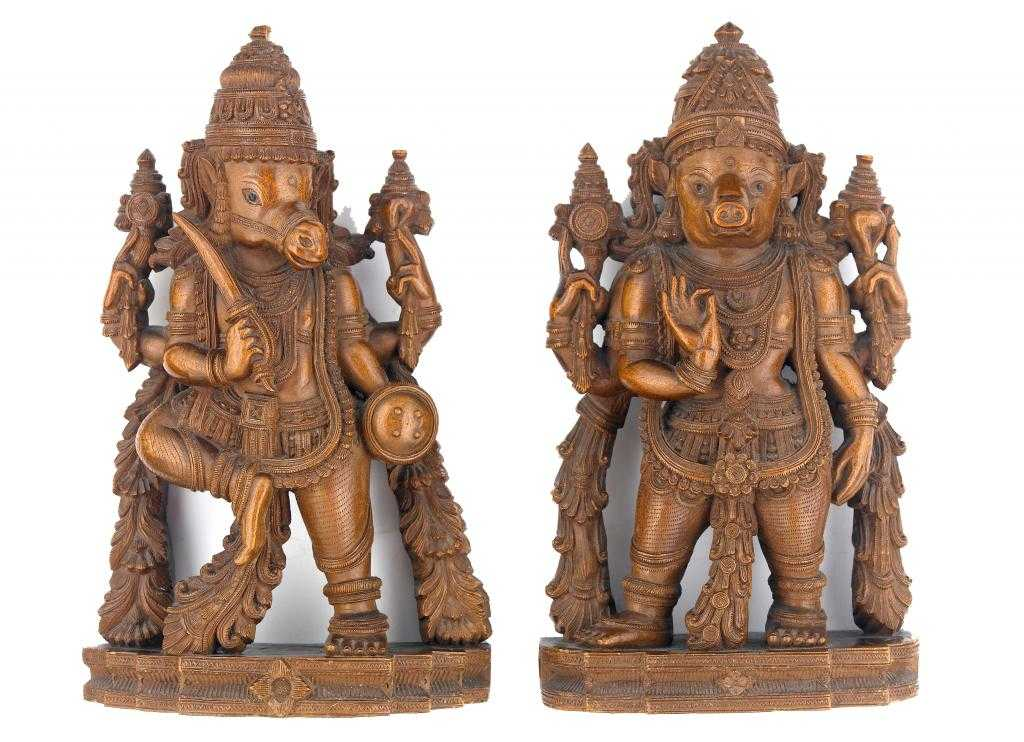 A PAIR OF INDIAN SANDALWOOD CARVINGS OF VISHNU MANIFESTED AS