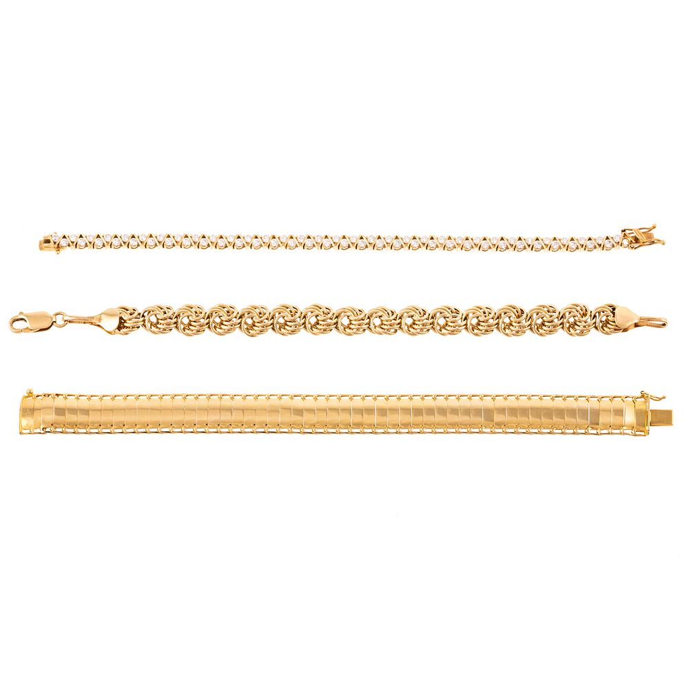 A Trio of Bracelets in 14K Yellow Gold 1 14K