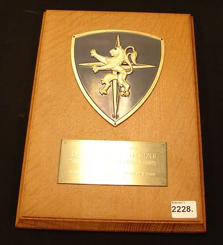Metal on wood measuring 10 x 7 with presentation plate