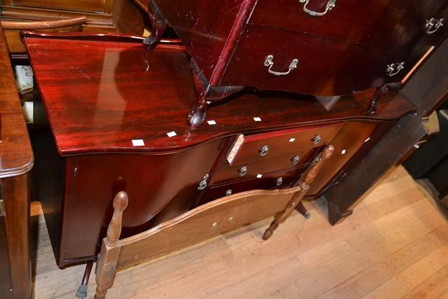 A MAHOGANY TWO DOOR FOUR DRAWER SIDEBOARD WITH CLAW FEET