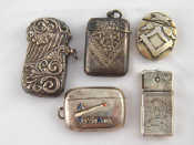 Unusual vestas An oval vesta with masonic symbols marked sterling