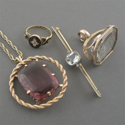 A gold fob seal with rock crystal matrix engraved with
