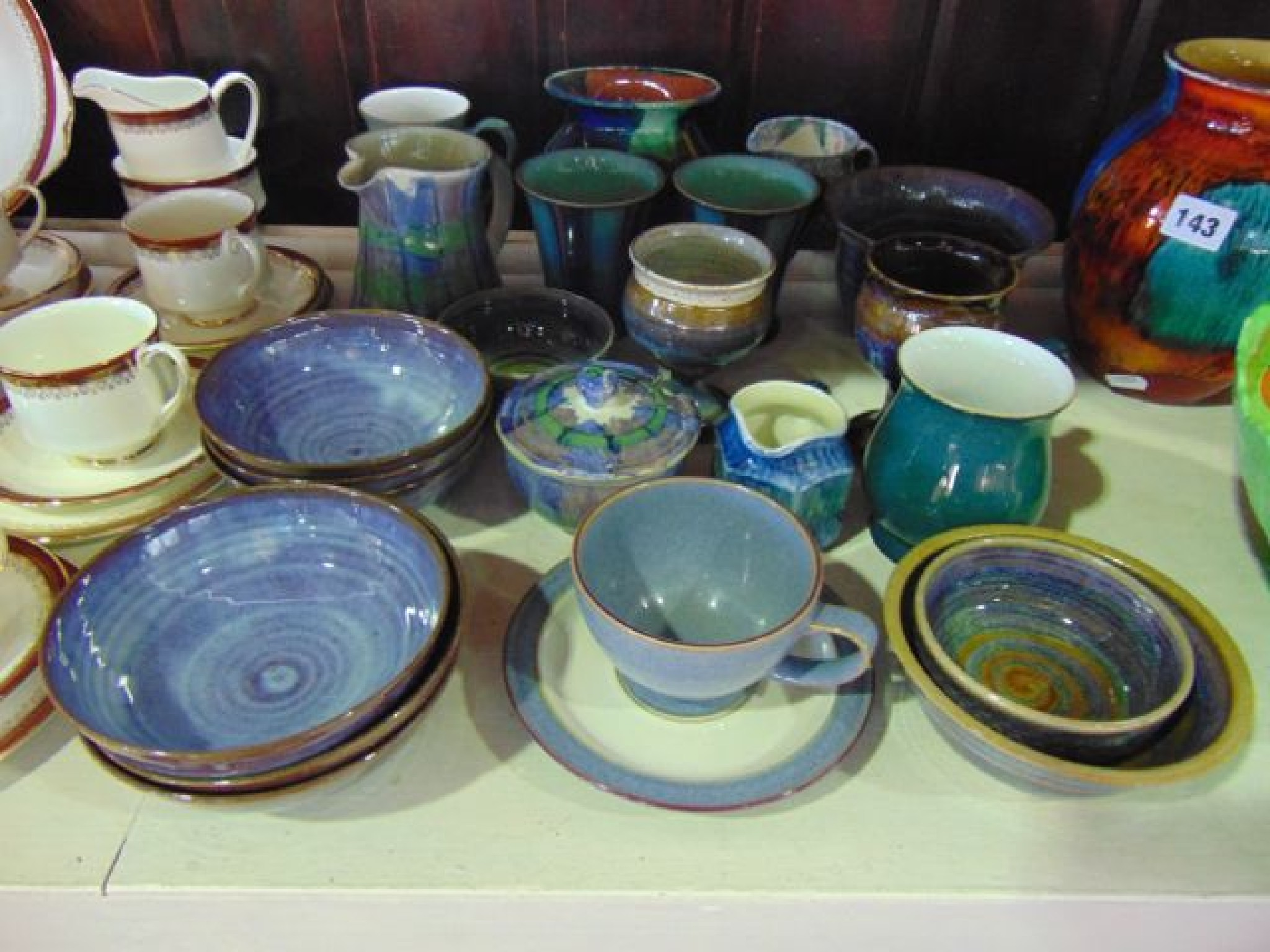 A collection of Studio Pottery wares with various blue mauve