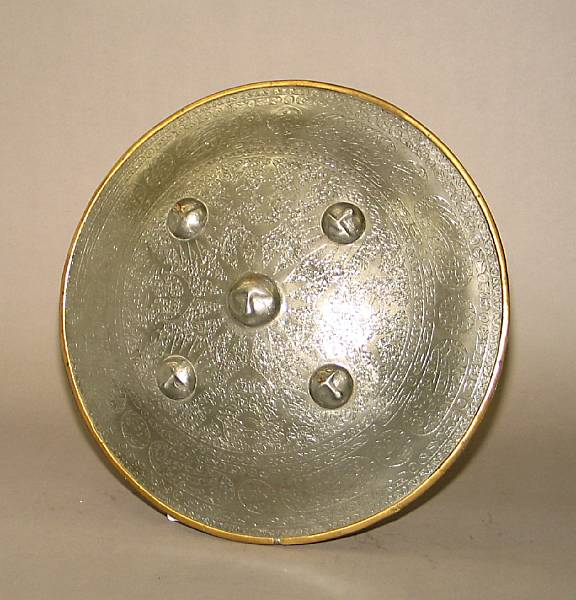 An Indian shield19th century The domed steel shield with central