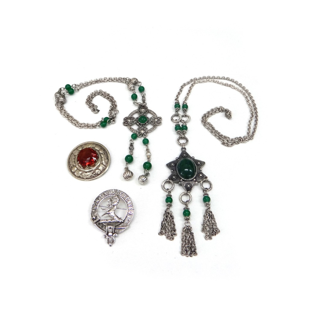 A white metal and green paste necklace of Celtic design