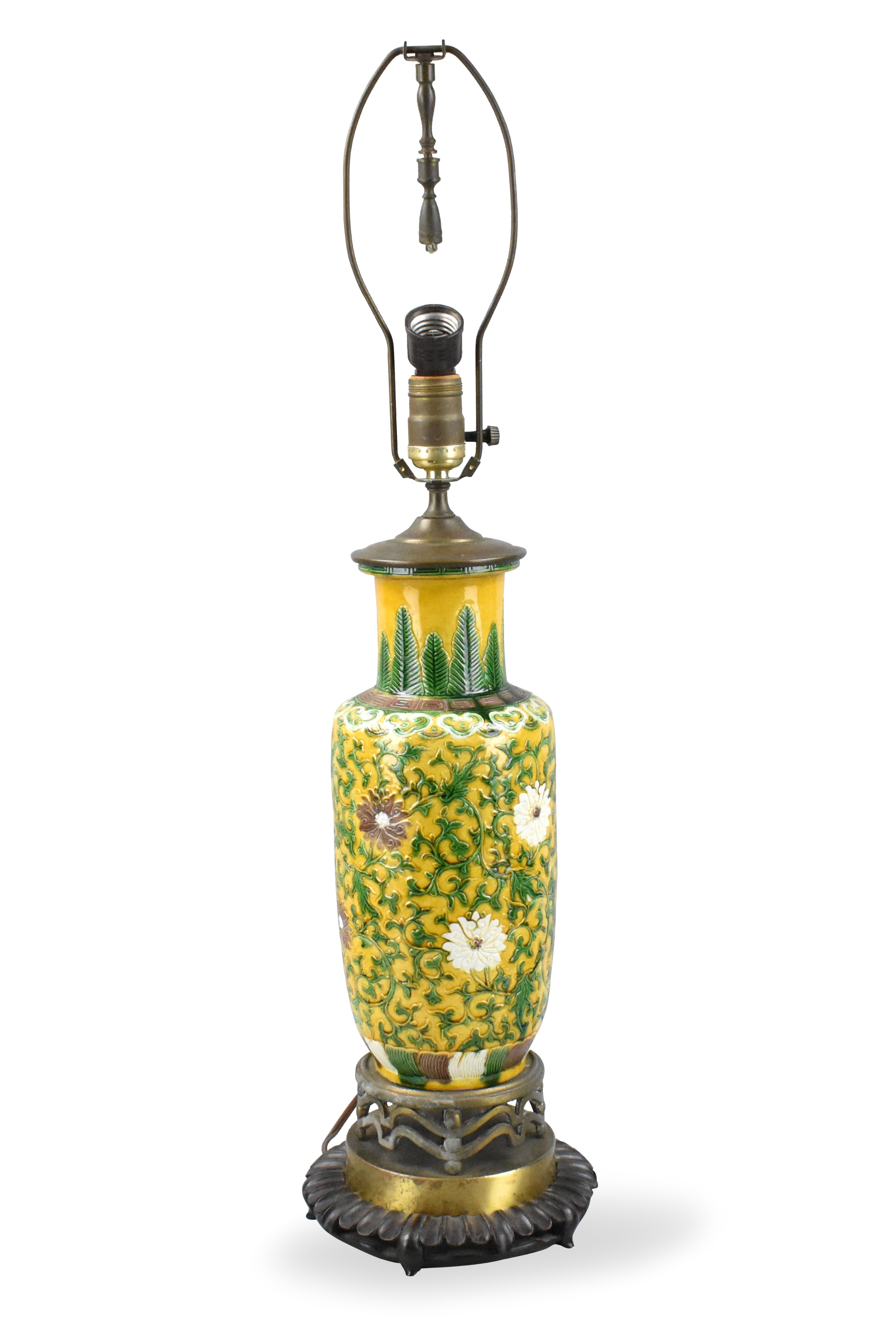 A Chinese sancai glazed scrolling lotus vase dating from the