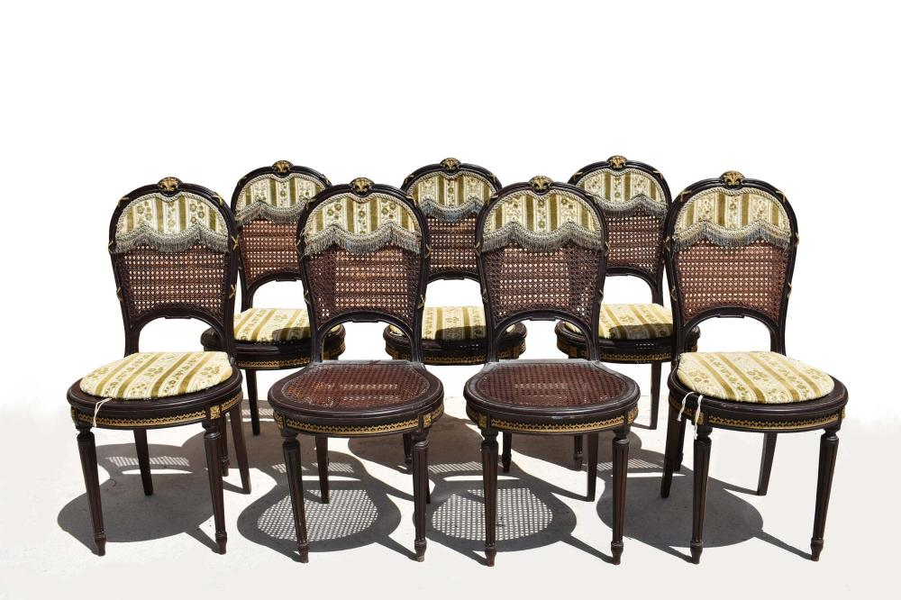 EIGHT LOUIS XVI STYLE CANED MAHOGANY DINING CHAIRSThe partially caned