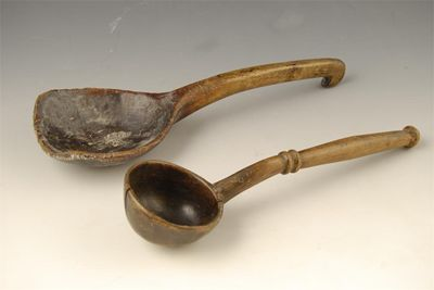 A 19th century treen long handled scoop with hooked end