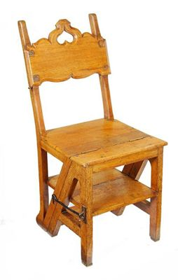 A Victorian oak steps chair the shaped back panel with