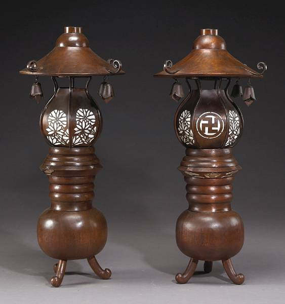 A pair of copper and carved wood temple lanterns Each