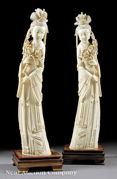 A Pair of Chinese Carved Ivory Figures of Guanyin each