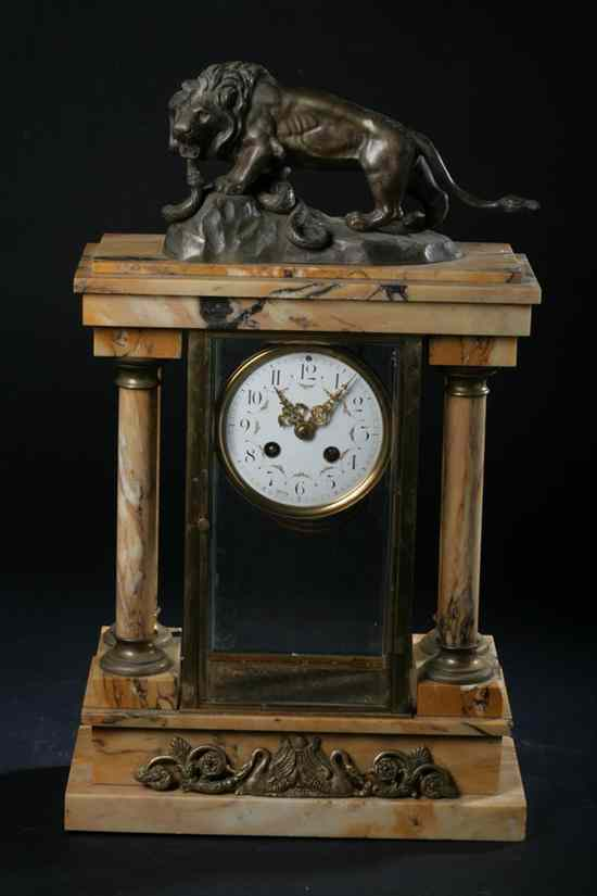 BRONZE MOUNTED OCHRE COLOR MARBLE ARCHITECTURAL MANTLE CLOCK Bronze figure