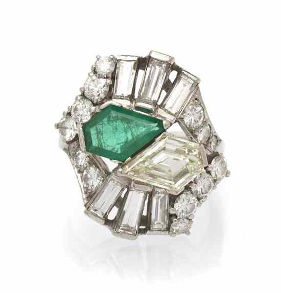 A Vintage Platinum Emerald and Diamond Ring Circa 1950 containing