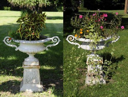 PAIR OF VICTORIAN PAINTED CAST IRON GARDEN URNS ON PEDESTALS