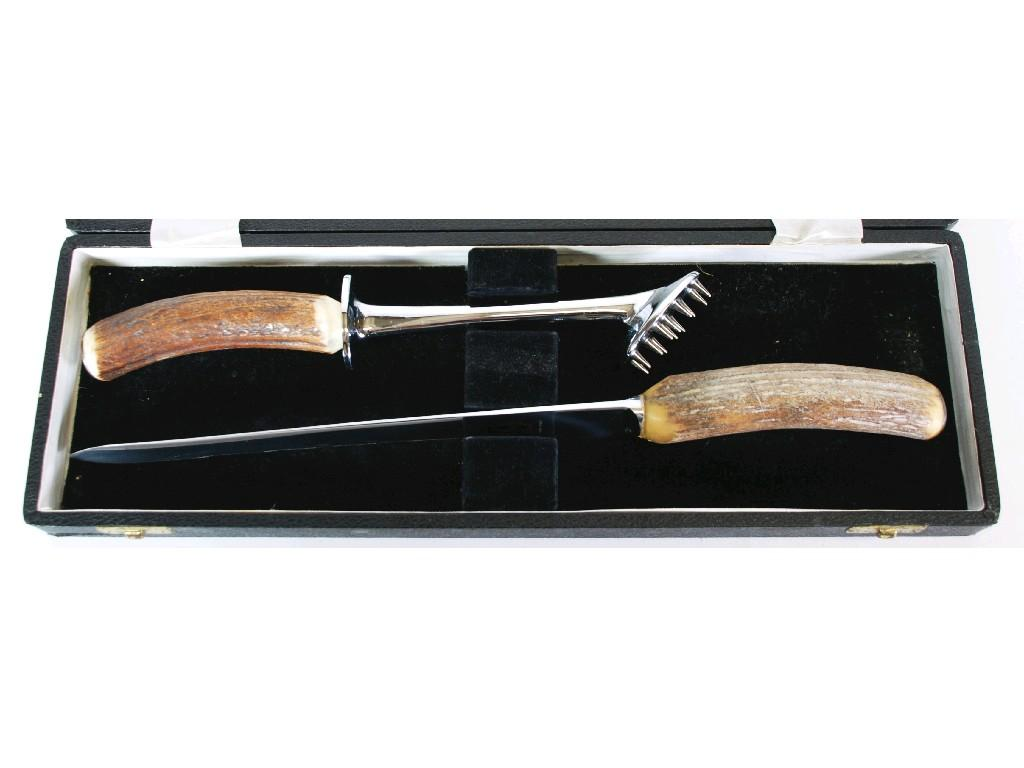 CASED PAIR OF VICTORIAN ELECTROPLATED FISH SERVERS with carved ivory