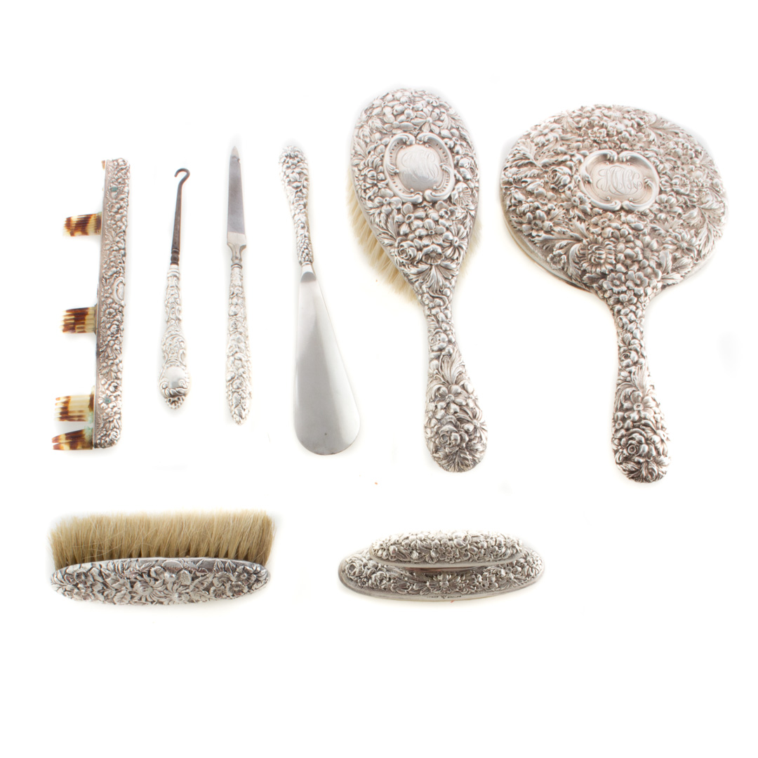 Kirk Stieff repousse sterling 7 piece vanity set comprising mirror