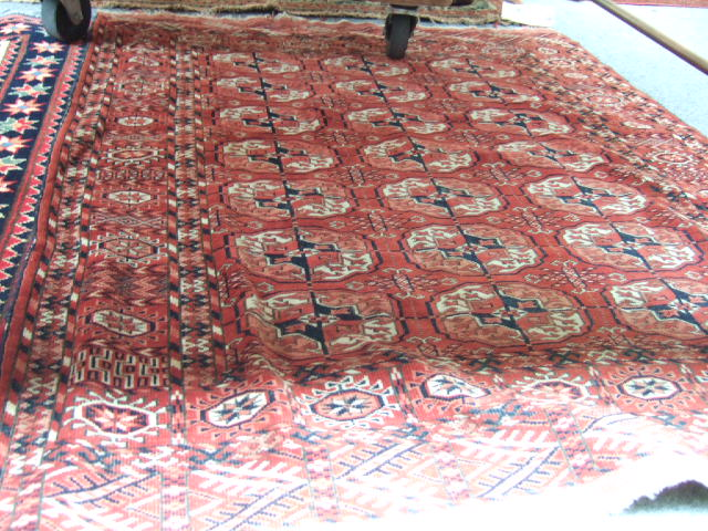 A Tekke Turkomen rug circa 1900 the madder field with