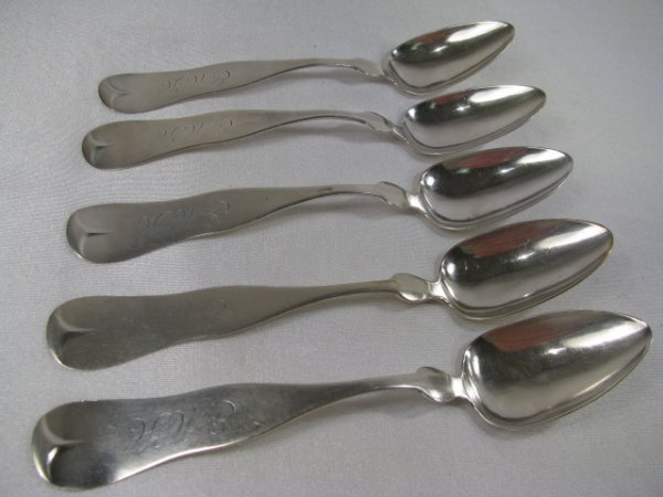 Five coin silver teaspoons stamped E Newbury Each with monogram