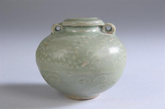 CHINESE CELADON PORCELAIN JARLET Circa 12th 13th century Molded with