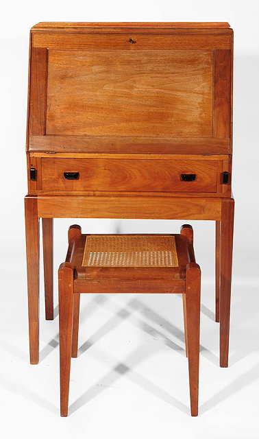 A Cotswold School walnut bureauwith fall front enclosing drawers and