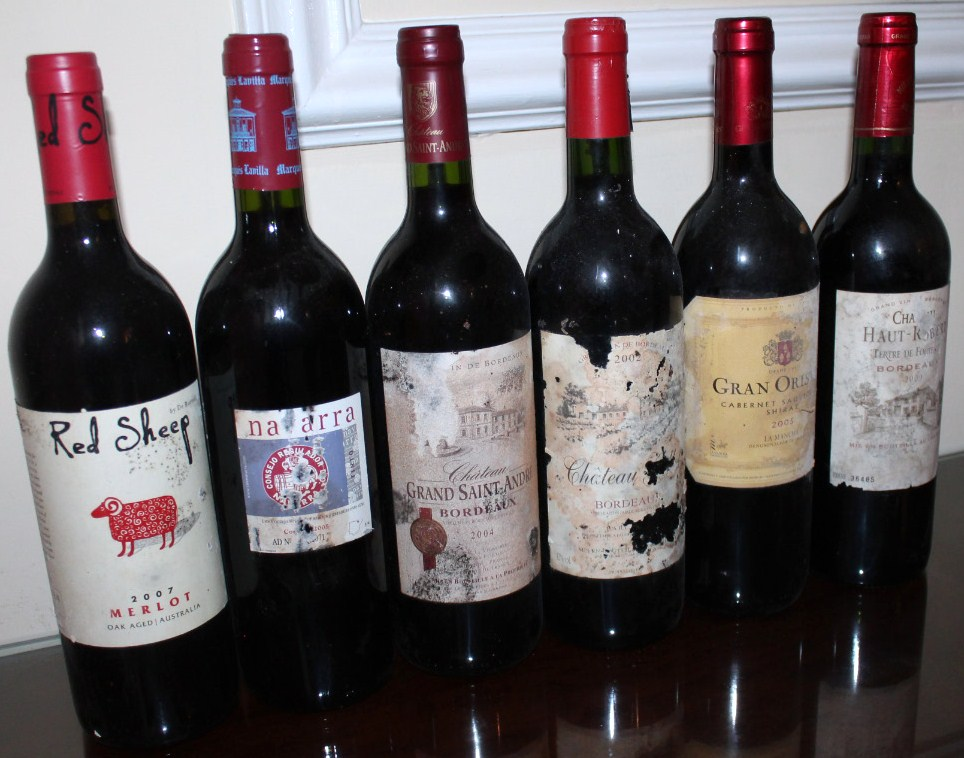 Six bottles of red wine including Chateau Haut Robert Bordeaux