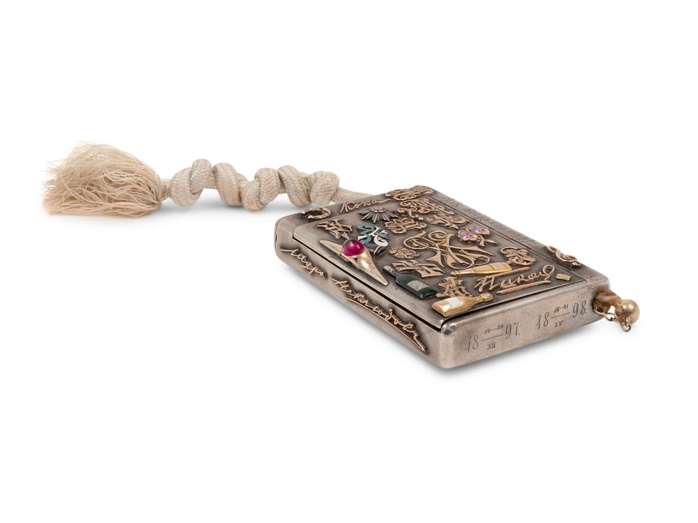 A Russian Silver and Applied Gold and Enamel Charm Decorated