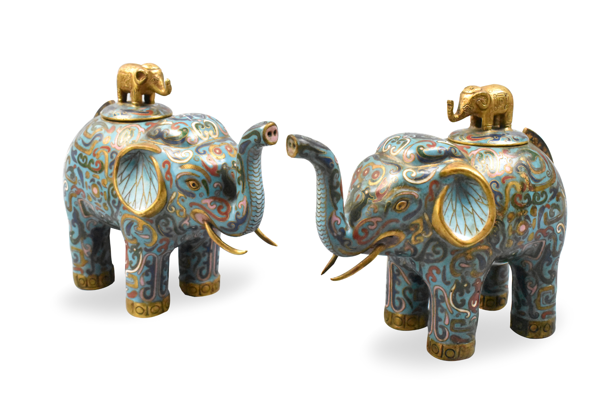 A pair of Chinese cloisonne elephants with covers dating from