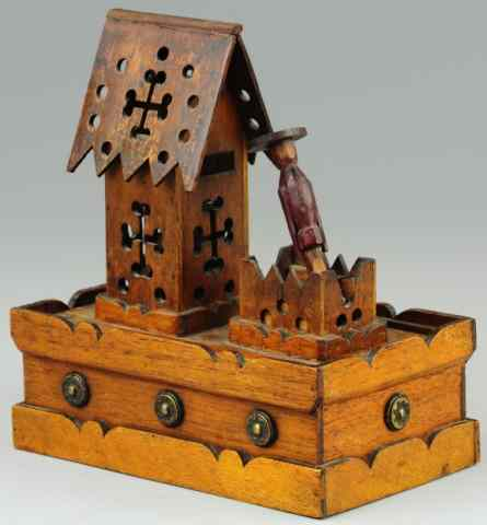 WOODEN FIGURE AT BUILDING MECHANICAL BANK Standing figure with tray