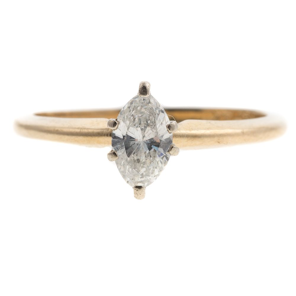 A Ladies Marquise Diamond Engagement Ring in 14K 14K yellow
