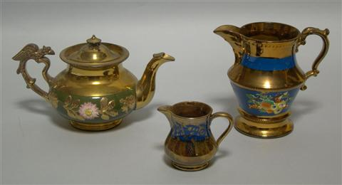 THREE PIECES OF LUSTRE WARE Comprising a teapot with molded