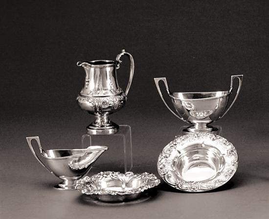 Assortment of five sterling table accessories repousse pitcher by Ellmore