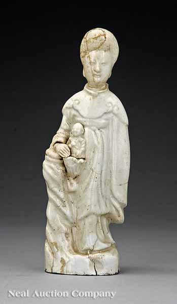 A Chinese White Glazed Figure of a Standing Guanyin probably