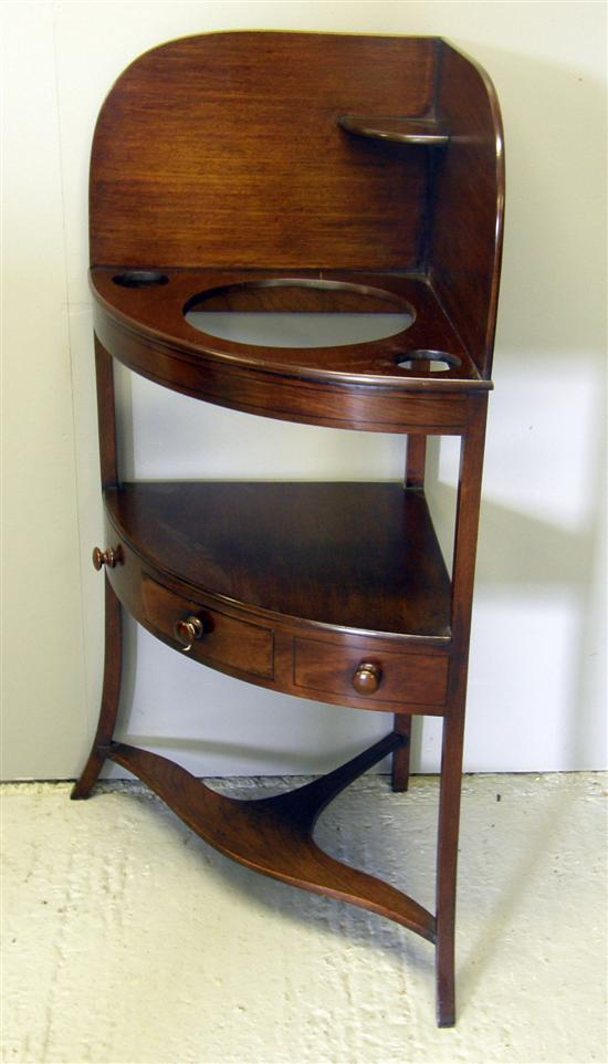 A 19th century mahogany two tier corner washstand the top