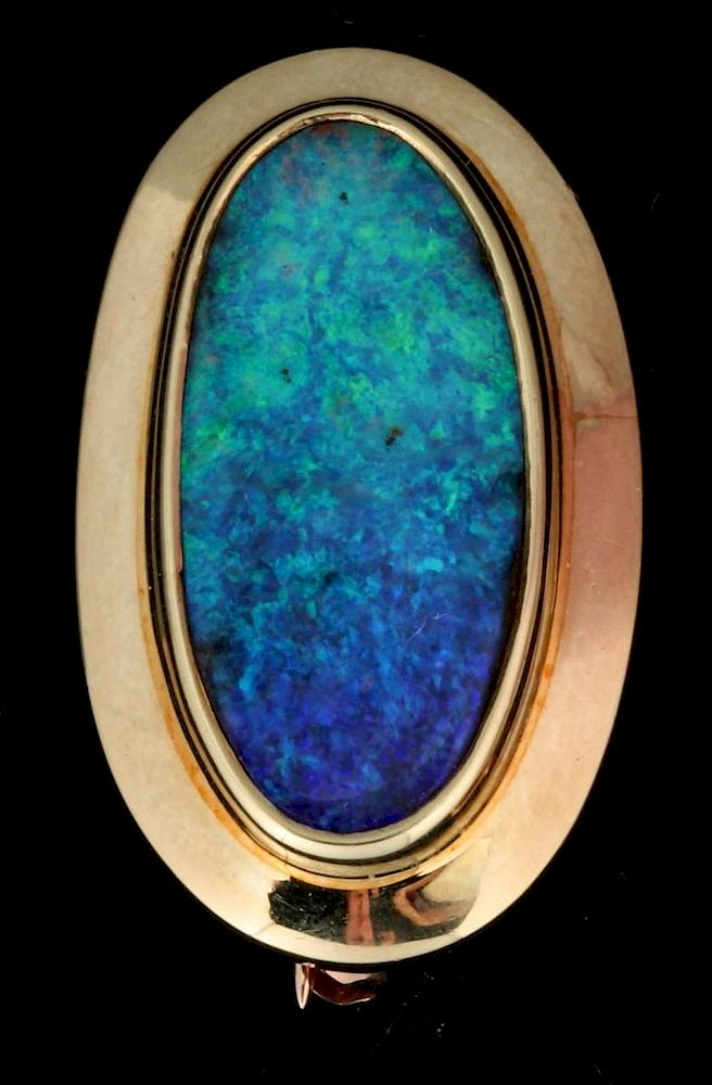 AN 18K GOLD AND OPAL BROOCH SIGNED MICKY ROOF The