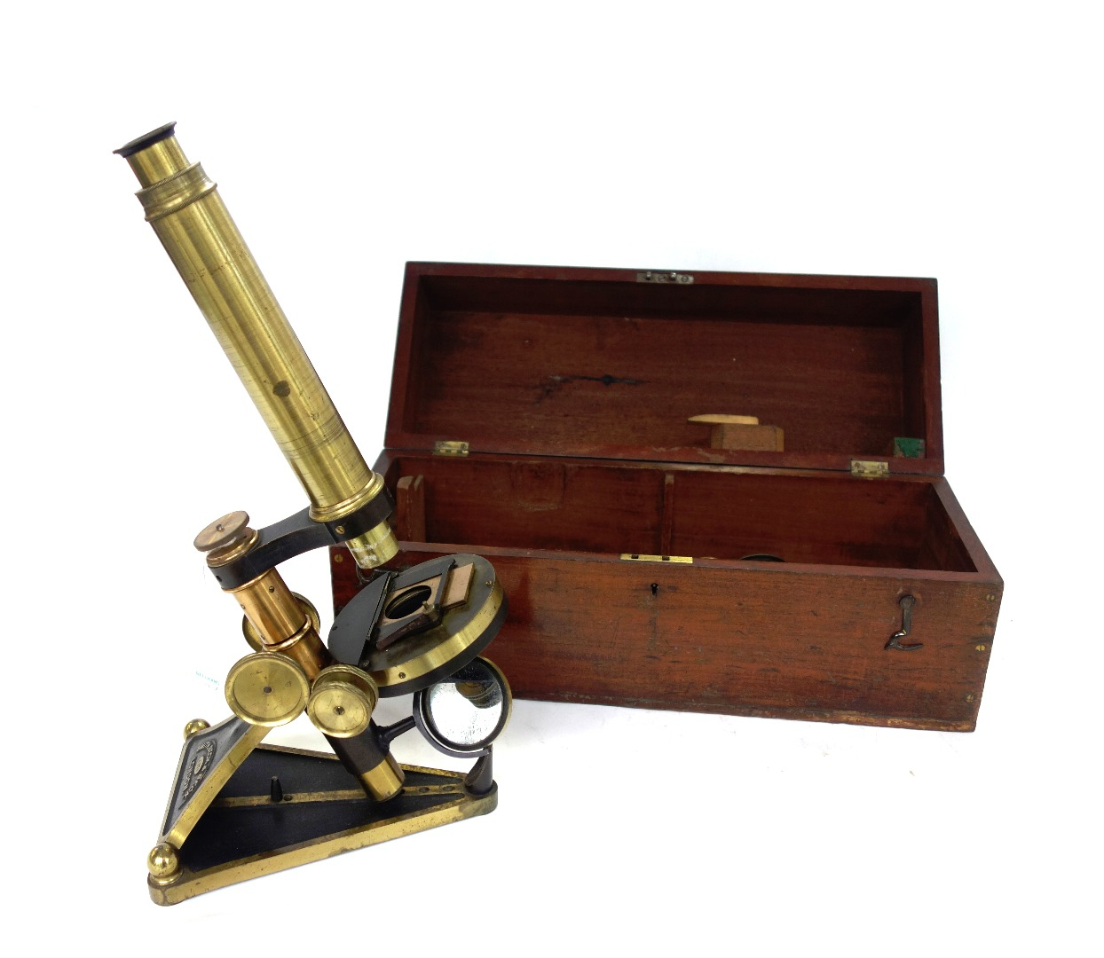 A Smith Beck Beck gilt and ebonised brass microscope 19th