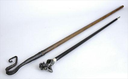 WROUGHT IRON HANDLED WOOD STAFF AND A WALKING STICK The