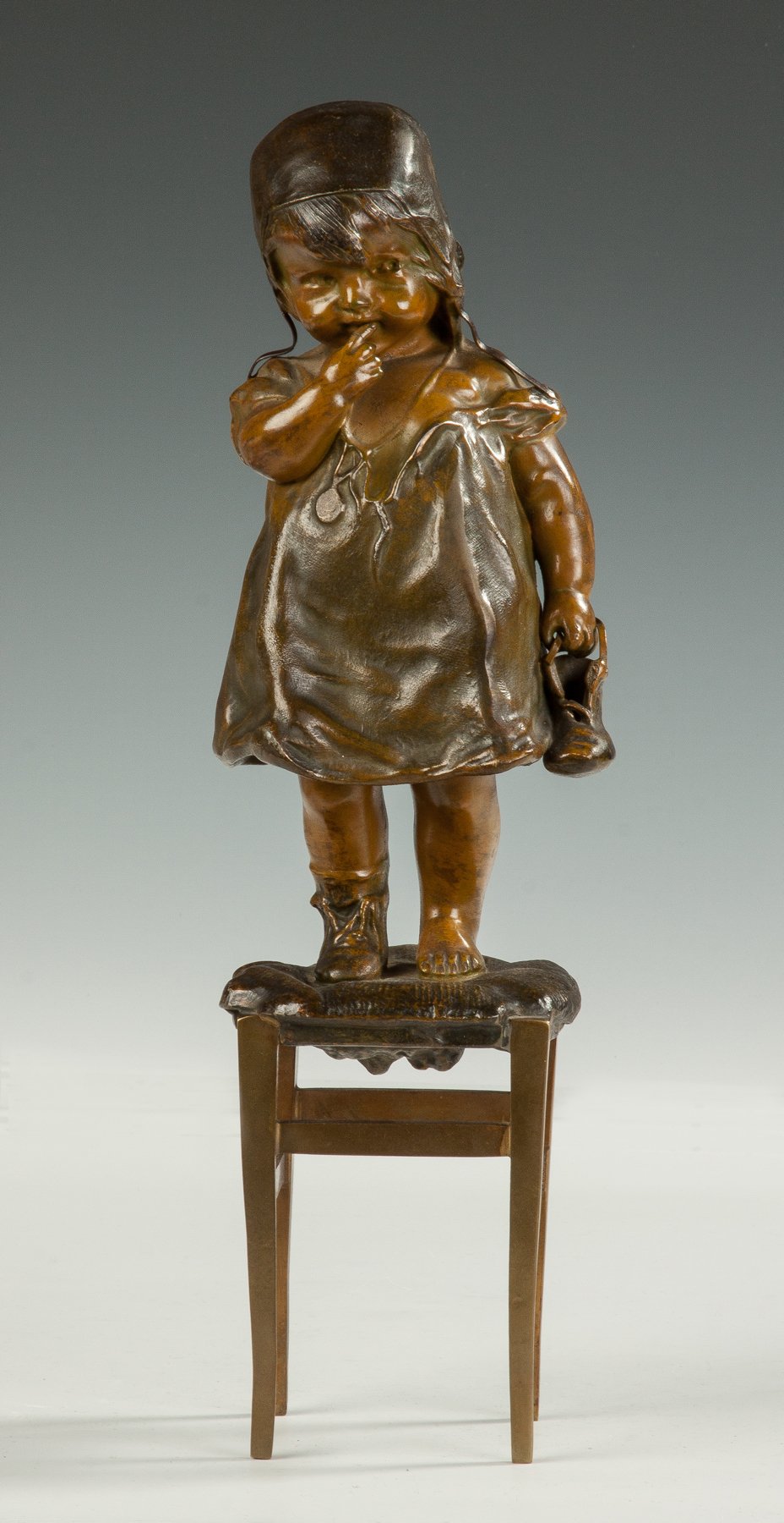Bronze Sculpture of a Girl with Shoe 19th cent Green