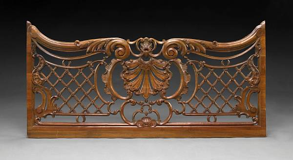 A pair of Continental Rococo style carved walnut architectural panels