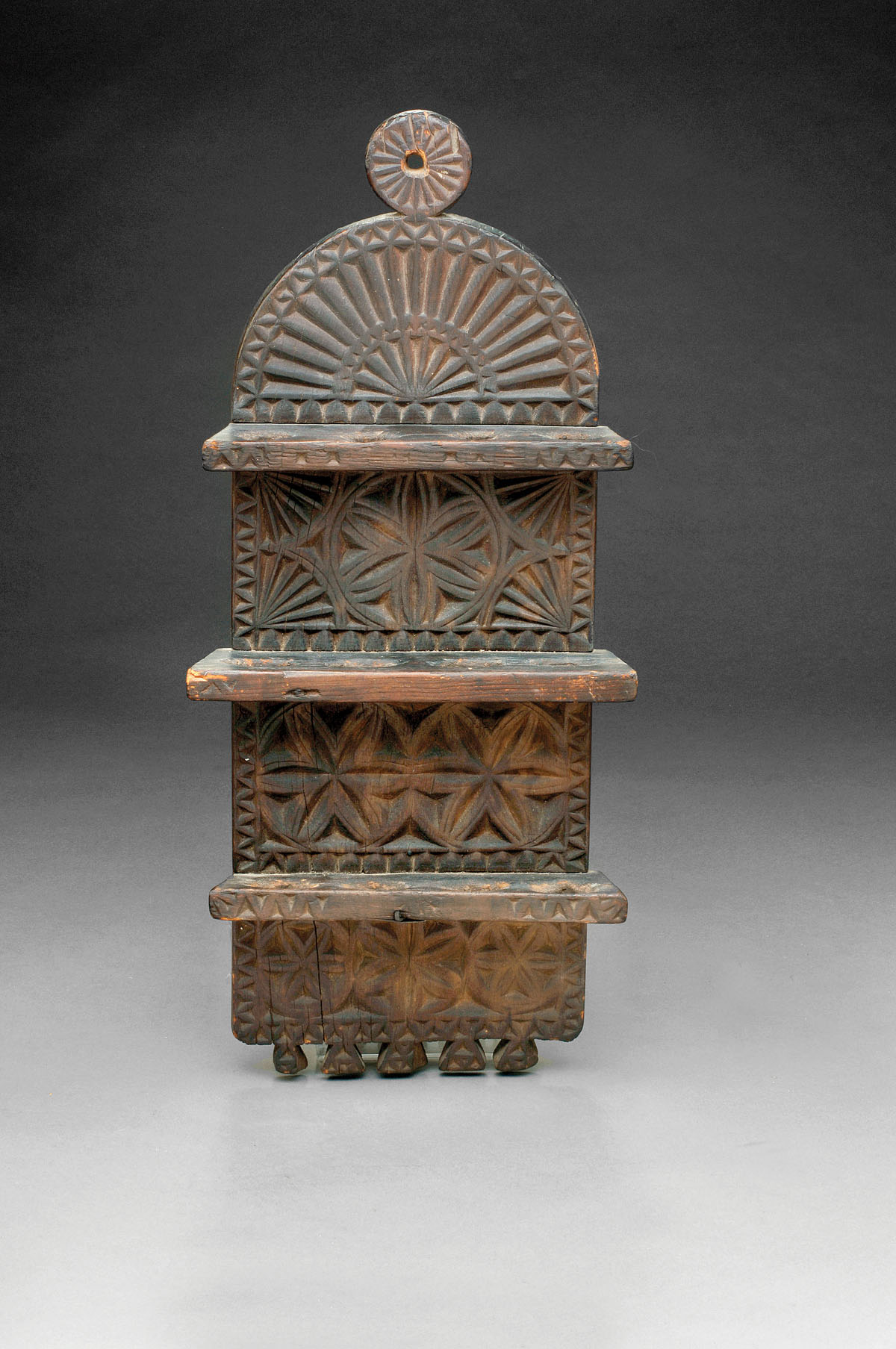 ELABORATELY CARVED SPOON RACK WITH PINWHEEL AND FAN DECORATION Height