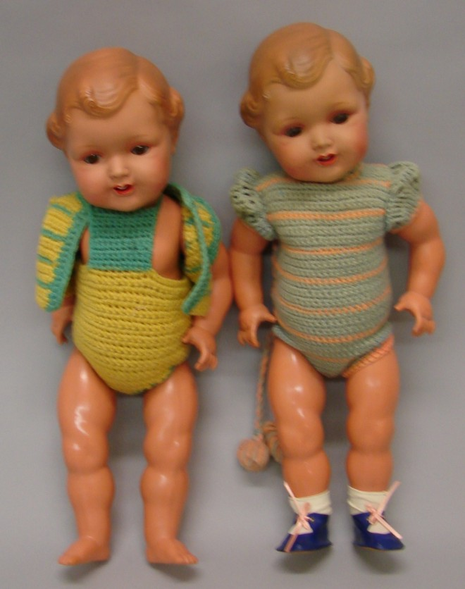 Pair of 16 celluloid dolls marked with the pelican symbol