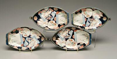 Four Japanese Imari serving pieces boat forms interiors with shaped
